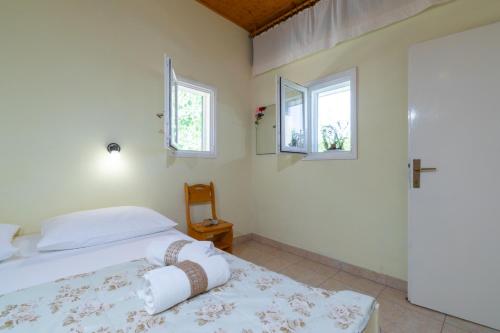 מיטה או מיטות בחדר ב-Holiday Home Liberan