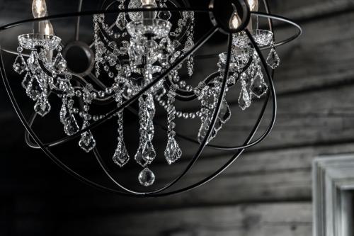 a chandelier with diamonds hanging from a ceiling at Skigaarden in Hemsedal