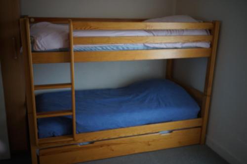 Ένα ή περισσότερα κρεβάτια σε δωμάτιο στο 57 M2 LES PIEDS DANS l EAU Cabourg