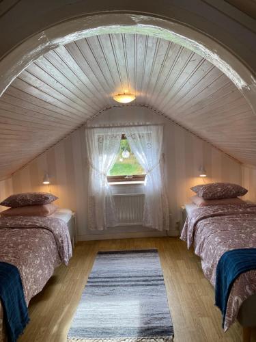 Postel nebo postele na pokoji v ubytování AirbnbEkåsberg