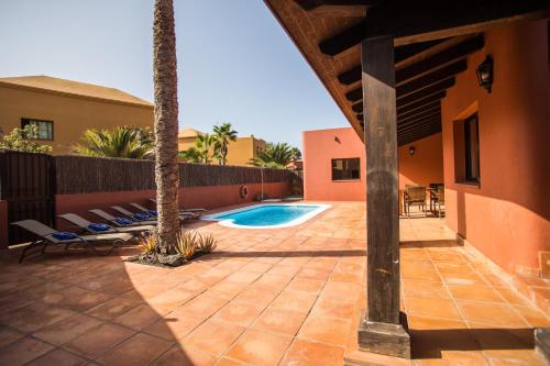 Fotografie z fotogalerie ubytování Casa Perla - villa with big garden and private pool v destinaci Corralejo