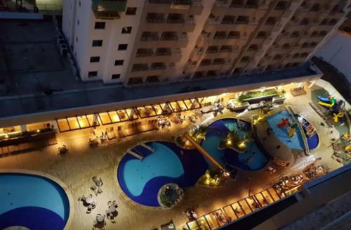 Pemandangan kolam renang di Olímpia - Apartamento 1 quarto - Enjoy - Olimpia Park Resort - Em frente ao Park atau berdekatan