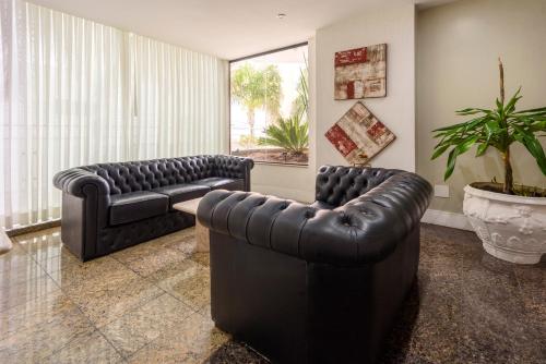 Posezení v ubytování Plaza Suite Hotel