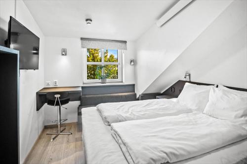 Tempat tidur dalam kamar di Apartments no