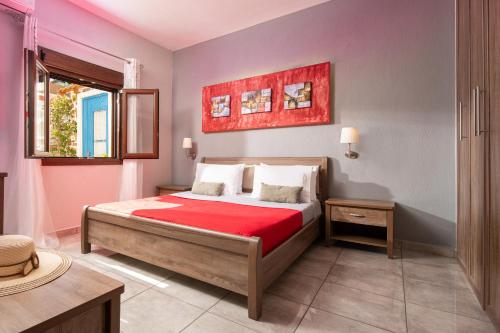 Ένα ή περισσότερα κρεβάτια σε δωμάτιο στο Xalonia Seaview