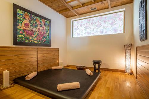 a meditation room with a large window on the wall at Pirin Golf Hotel & Spa in Bansko