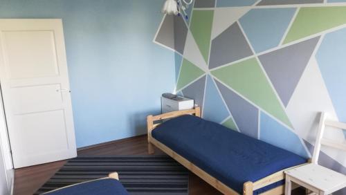 Postel nebo postele na pokoji v ubytování Central MaxiStay