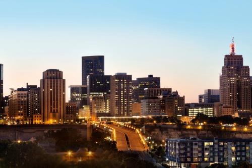 a city skyline at night with lights at InterContinental St. Paul Riverfront by IHG in Saint Paul