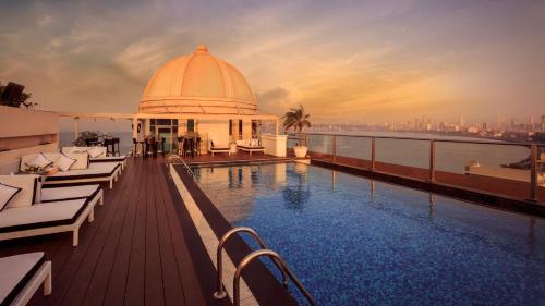 a pool on the roof of a building at InterContinental Marine Drive Mumbai by IHG in Mumbai