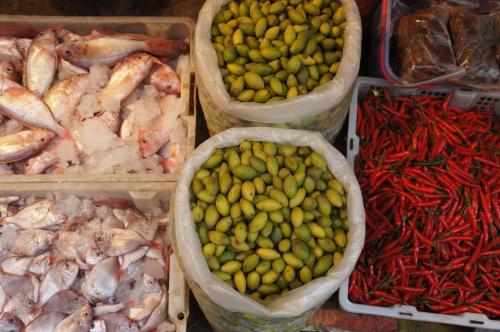 a display of different types of seafood and vegetables at Hotel Indigo Xiamen Harbour by IHG in Xiamen