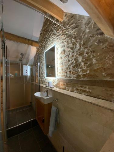 a bathroom with a sink and a shower at Ida’s Nook in Norton Saint Philip