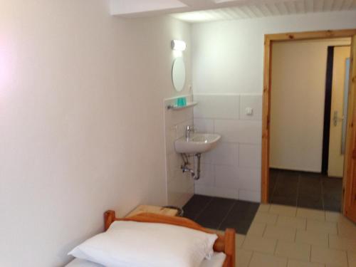 Koupelna v ubytování Hotel & Restaurant Jägerstuben