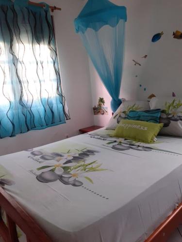 Katil atau katil-katil dalam bilik di Villa GJ