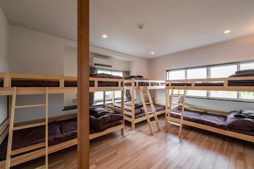 Palanda nebo palandy na pokoji v ubytování private villa 九十九里