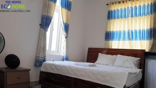 Ένα ή περισσότερα κρεβάτια σε δωμάτιο στο The Muine Eco Home