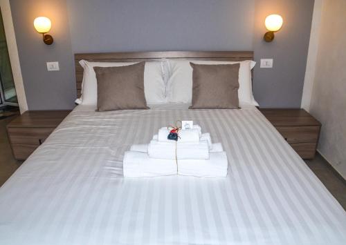 Ein Bett oder Betten in einem Zimmer der Unterkunft Vicoli di Napoli B&B