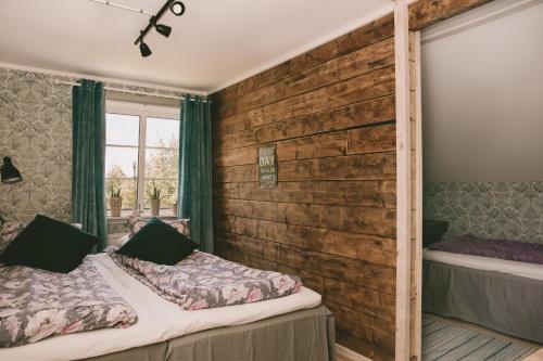 Postel nebo postele na pokoji v ubytování Toric Farmlodge