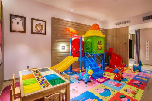 a childrens play room with a play set at Hotel Indigo Xiamen Harbour by IHG in Xiamen