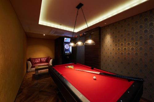 a billiard room with a pool table in it at HOTEL Artia Nagoya (Adult Only) in Kitanagoya
