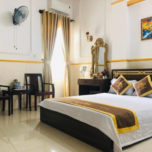 Katil atau katil-katil dalam bilik di King Hotel Quang Ngai