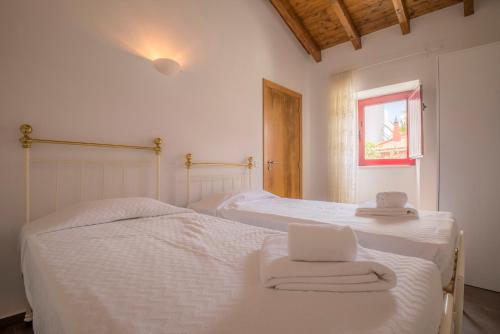Postel nebo postele na pokoji v ubytování C14 - Casa da Luz