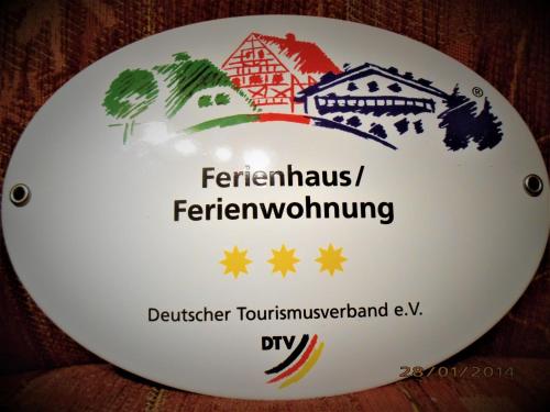 a plate with the words ferretti ferretti flewontouring at Ferienwohnung Peuker in Neukirchen bei Sulzbach-Rosenberg