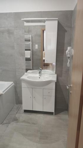 Kúpeľňa v ubytovaní Solaris Apartman
