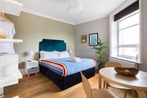 Llit o llits en una habitació de Hausd Flex - Covent Garden