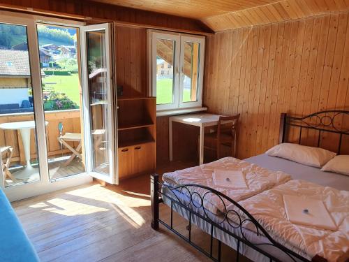 Postel nebo postele na pokoji v ubytování Lake Lodge Hostel