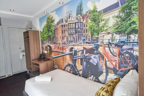 a room with two bikes on the wall at The Townhouse Hotel in Amsterdam