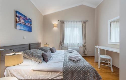 Postel nebo postele na pokoji v ubytování Villa Andrea