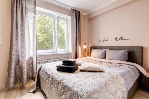 Postel nebo postele na pokoji v ubytování Aura, City Center, Tartu Home