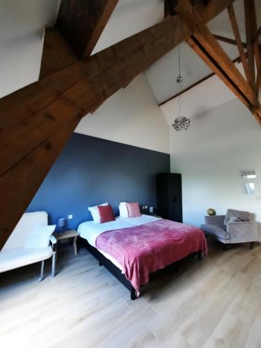 En eller flere senger på et rom på De Blauwe Hoeve