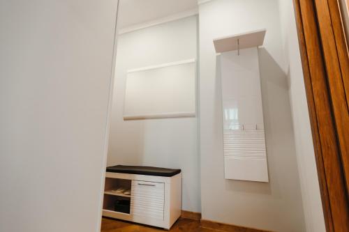a small white closet with a small white cabinet at Nicole in Uzhhorod