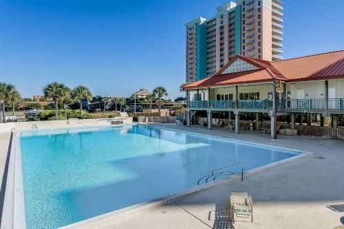 a large swimming pool in front of a building at Santa Rosa Dunes 923 in Pensacola Beach