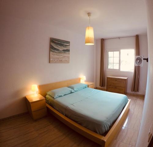 Postel nebo postele na pokoji v ubytování Beach apartment with pool