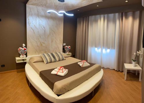 A bed or beds in a room at TH LUXURY fly