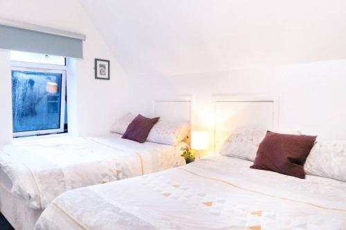 Posteľ alebo postele v izbe v ubytovaní Apartment up to 9 close to Centre, big TV and WiFi