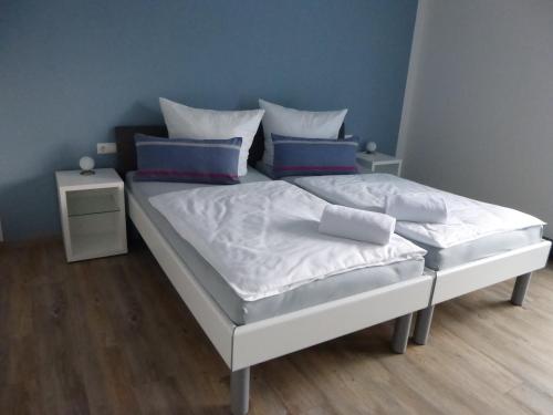 Katil atau katil-katil dalam bilik di E&B-Apartments Weingarten