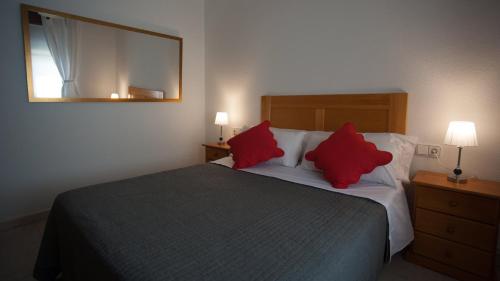 Ένα ή περισσότερα κρεβάτια σε δωμάτιο στο Apartamento junto a la Universidad y la Catedral