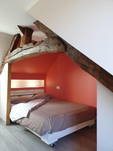 Postel nebo postele na pokoji v ubytování Le Fiege gîte cosy et confort