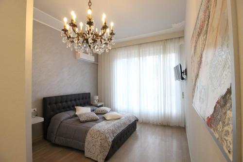 Postel nebo postele na pokoji v ubytování Ad Astra Rooms