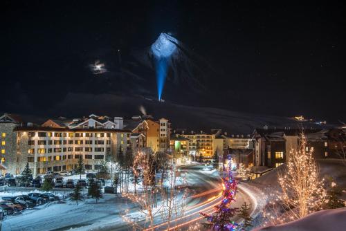a city lit up at night with christmas lights at Updated 1 Bedroom Condo in Mountaineer Square condo in Crested Butte