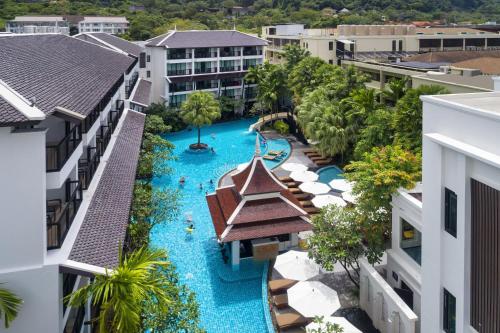 an aerial view of a pool at a resort at Centara Anda Dhevi Resort & Spa Krabi in Ao Nang Beach