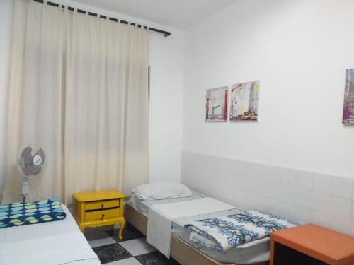 Łóżko lub łóżka w pokoju w obiekcie Orion Hostel Congonhas