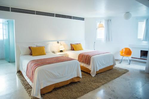 Ein Bett oder Betten in einem Zimmer der Unterkunft Anticavilla Hotel Restaurante & Spa