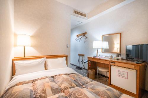 Кровать или кровати в номере Tabist Hotel Mercury Asakusabashi