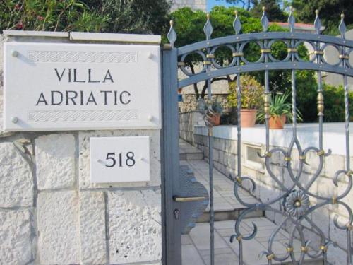 a sign that reads villa adirita behind a gate at Holiday Home Adriatic in Lumbarda