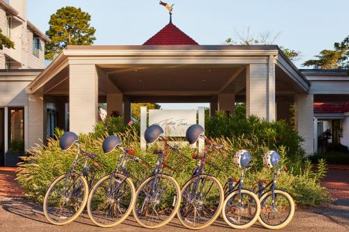 a group of bikes parked in front of a building at The Tides Inn in West Irvington