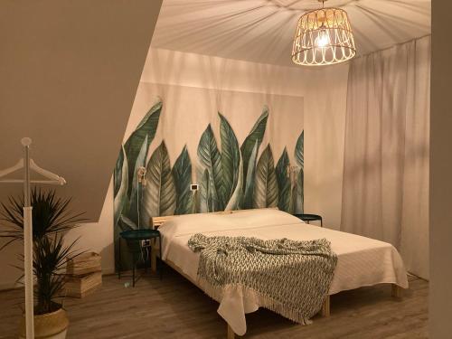 A bed or beds in a room at Sunrise